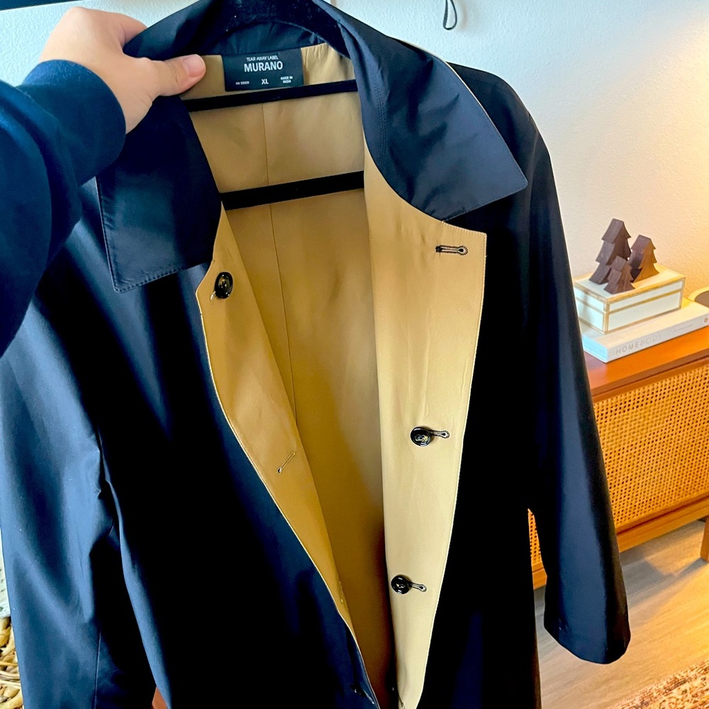 Two lightweight 3/4 length jackets that are reversible